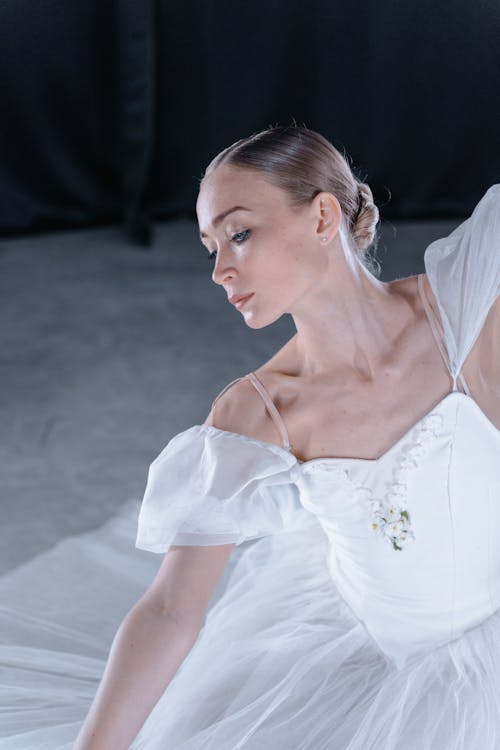 A Ballerina in a White Dress
