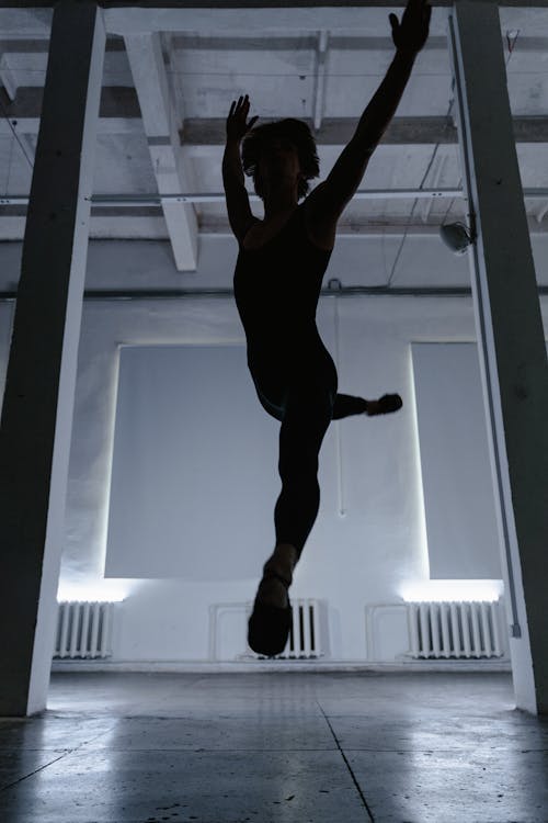 Free Photo of a Ballet Dancer Midair Stock Photo