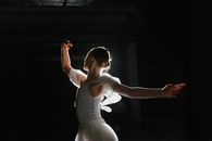 Woman in White Dress Dancing