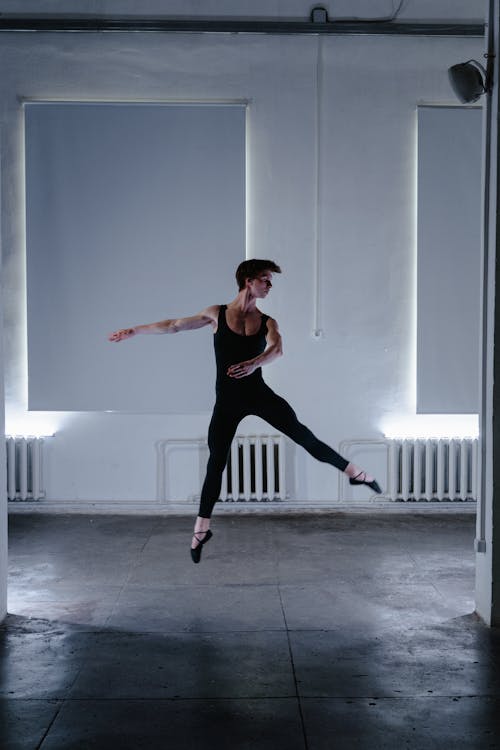 Man in Black Tank Top and Leggings Ballet Dancing