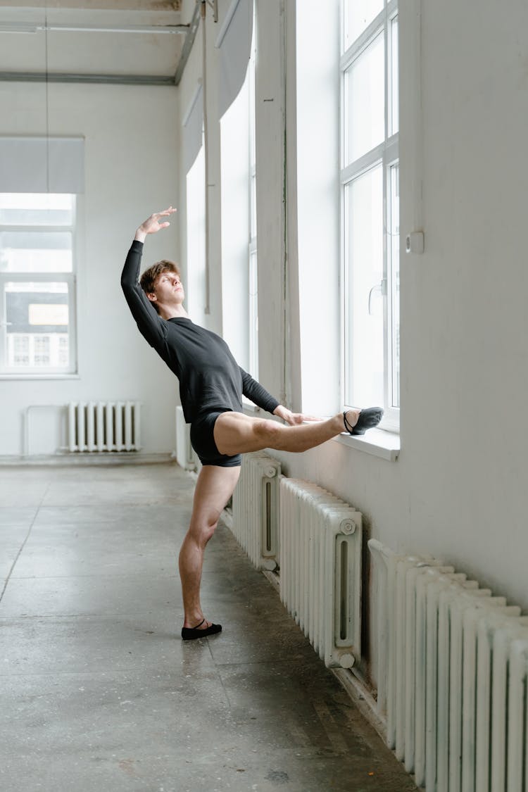 Man Doing Ballet Dance Warm Up