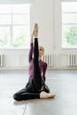 Woman in Black Dress Bending Her Body