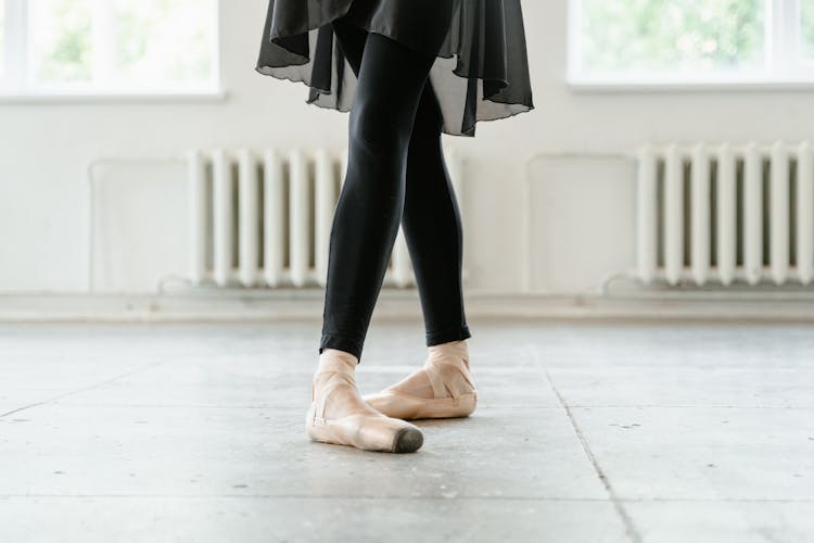 A Woman Wearing Ballet Shoes