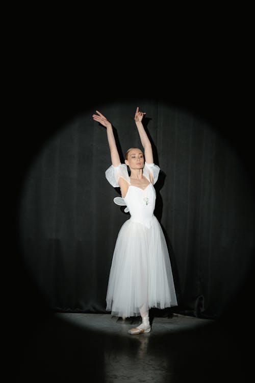 Ballerina in White Dress Dancing