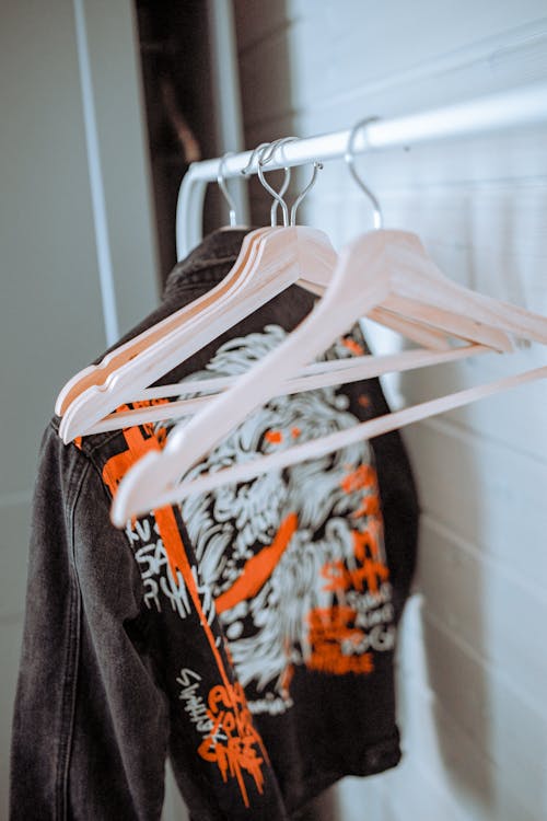 Denim Jacket Hanging on a Clothes Rack