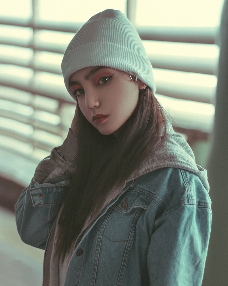Young Woman In A White Beanie Hat 