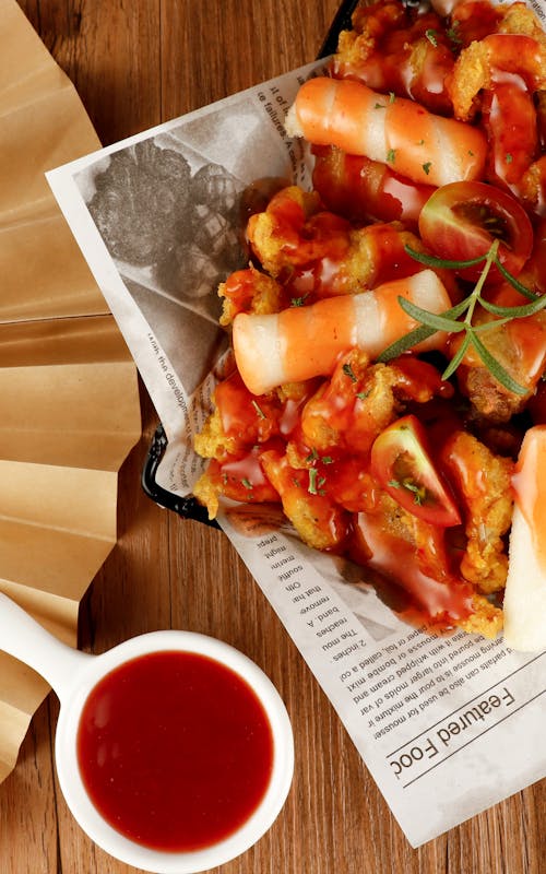 Deep Fried Food with Sauce Served in a Restaurant 