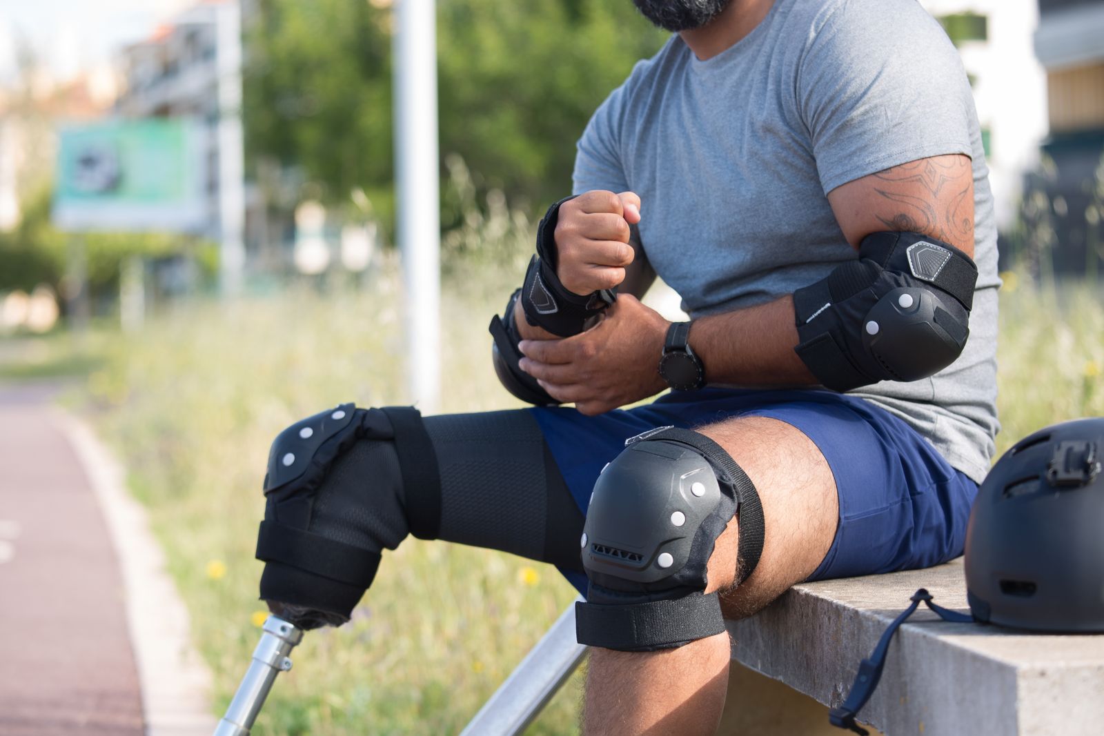 Person resting on a sofa with a knee wrapped during home recovery