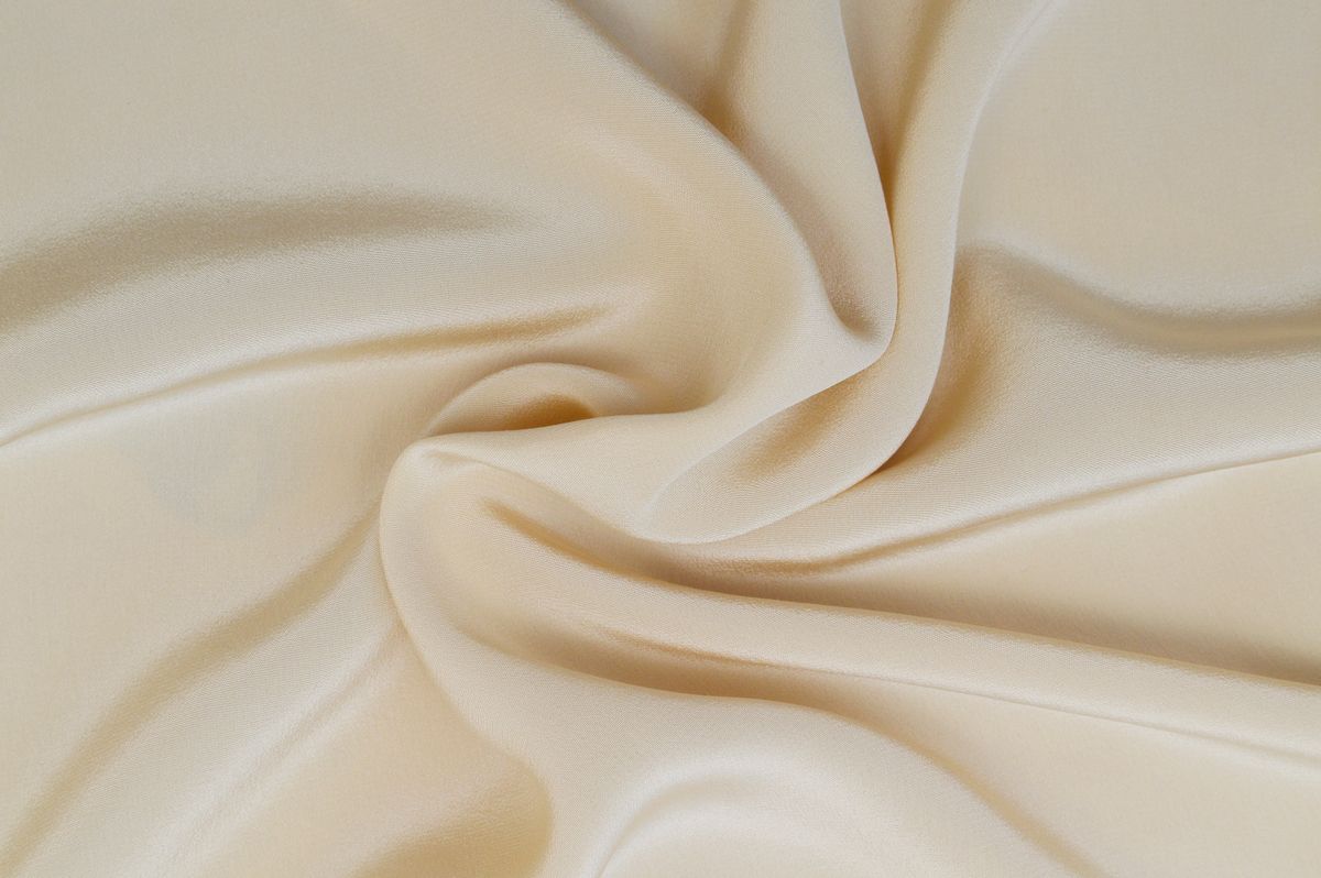 Close-up neutral textile with soft folds