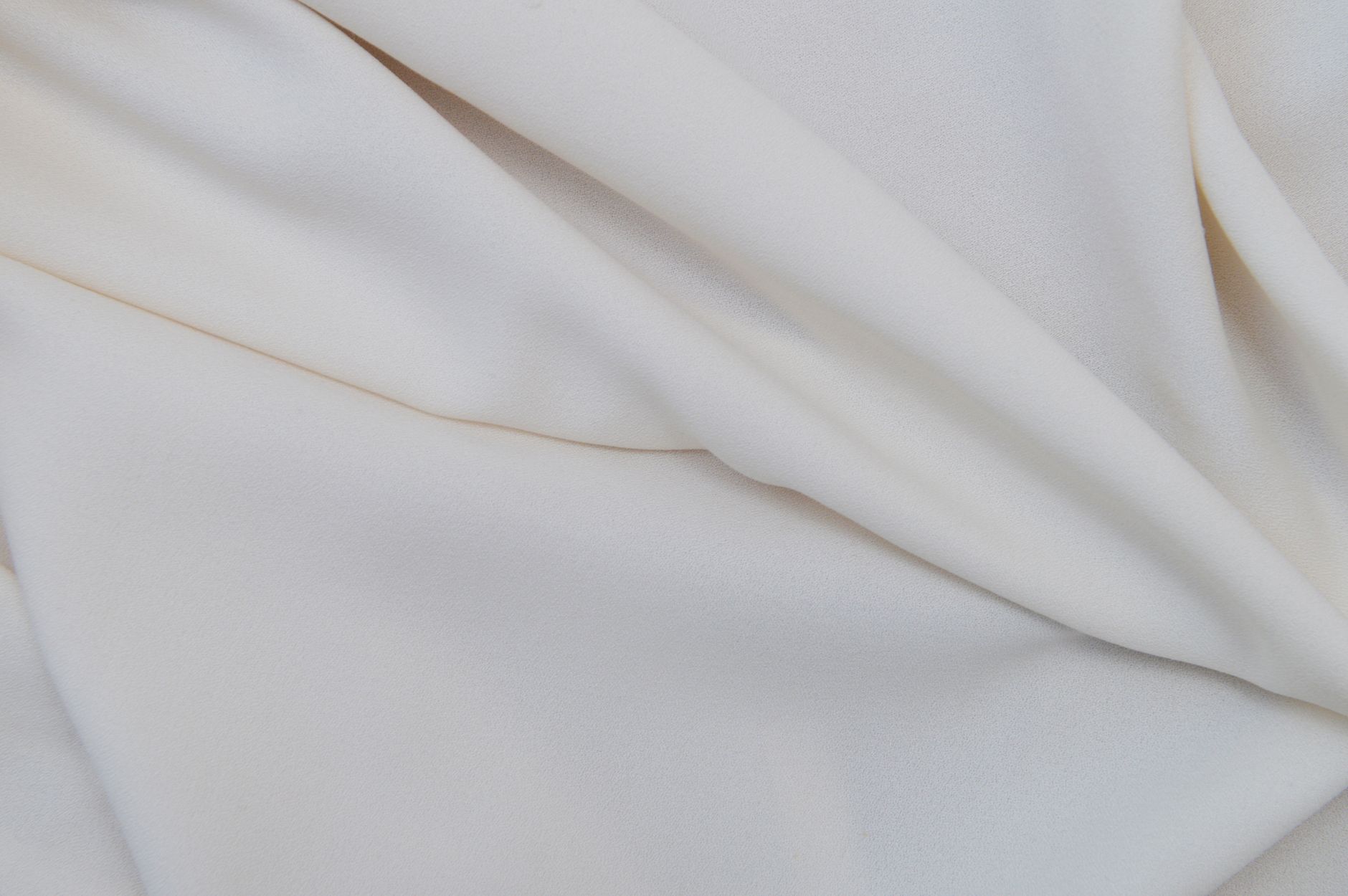 Close-up of white fabric — hypochlorous acid is safe for cotton and most everyday fabric types at home concentrations