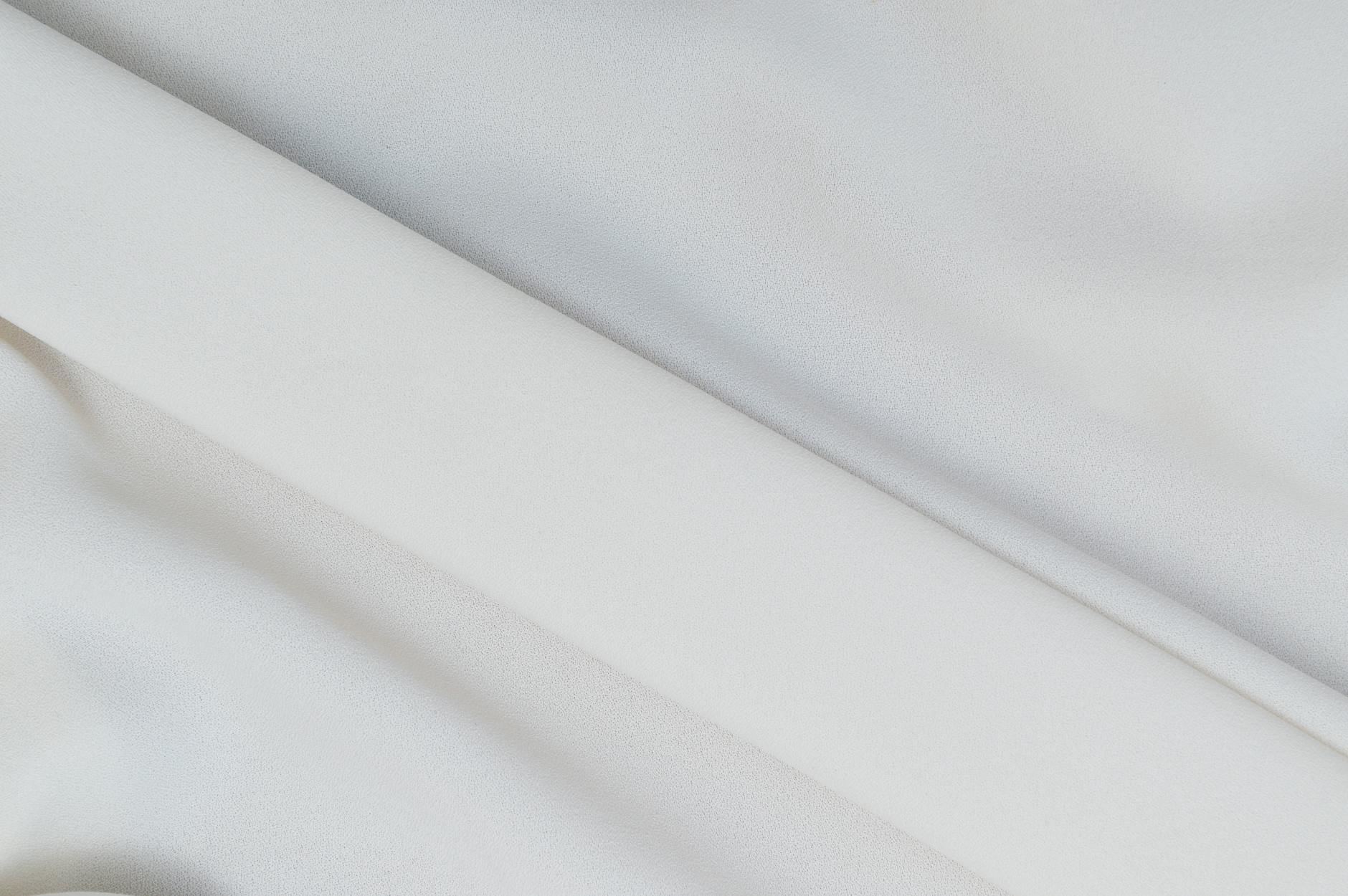 Close up image of white textile