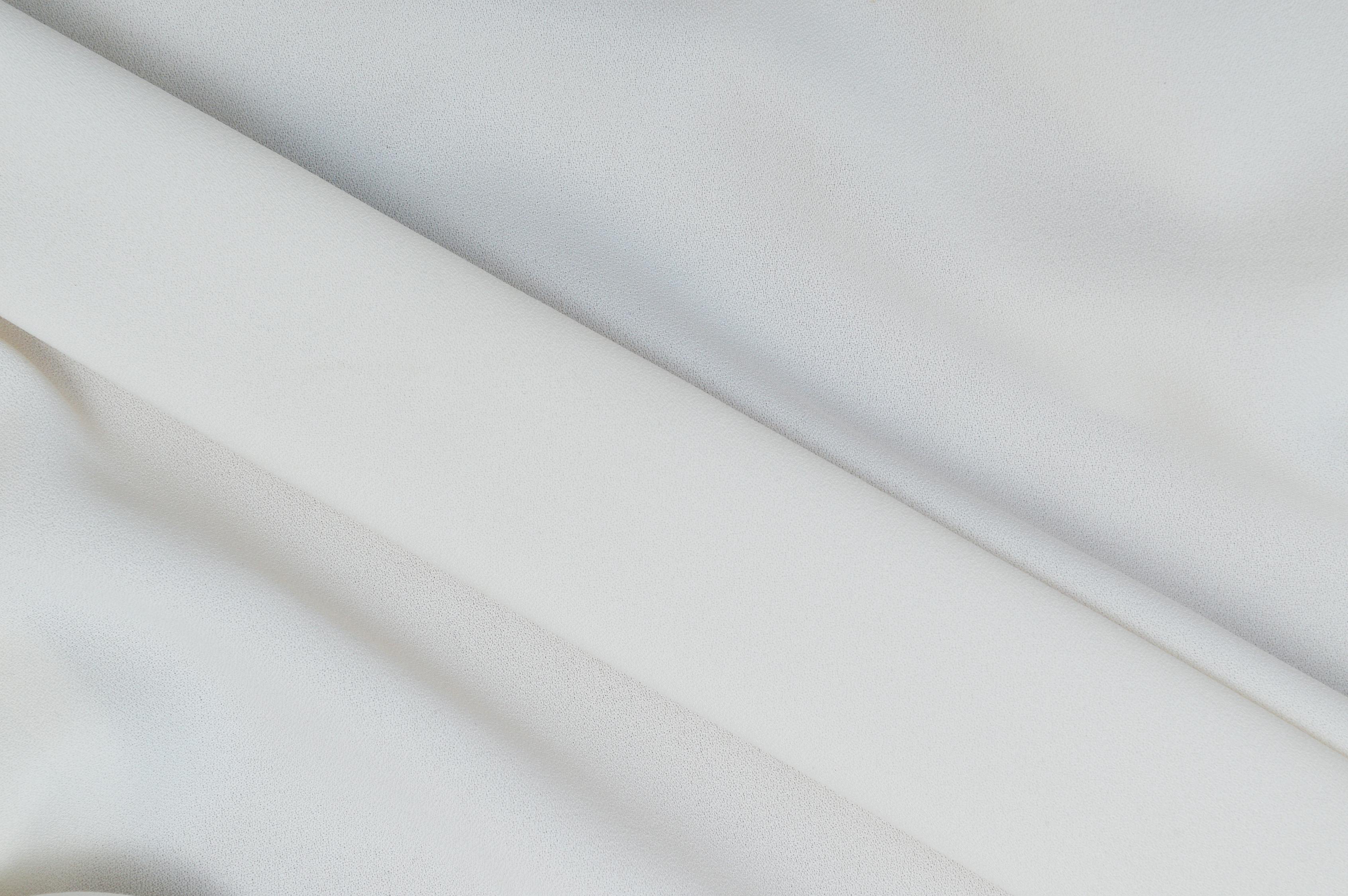 Close-Up Photo of a Smooth White Textile · Free Stock Photo