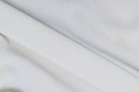 Close-Up Photo of a Smooth White Textile