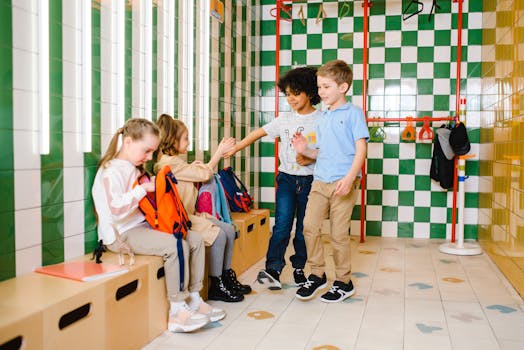Kids interacting in a school locker room, showcasing friendship and happiness.