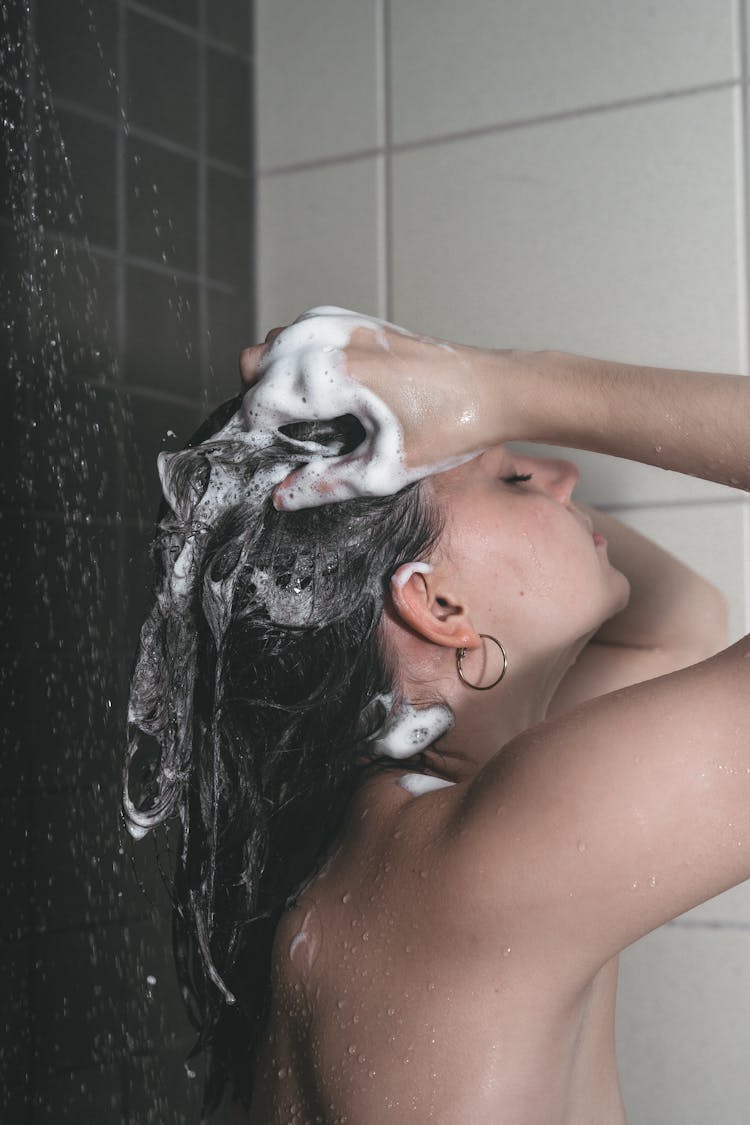 A Woman Washing Her Hair 