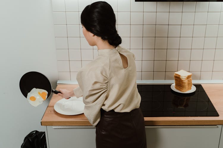 Woman Throwing Eggs In The Trash