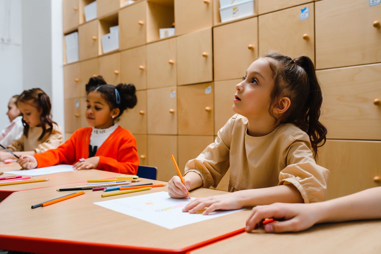 Children in creative classroom session