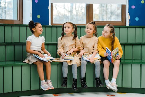 Free Children Sitting in the Classroom Stock Photo