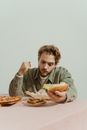 A Man Sitting at the Table