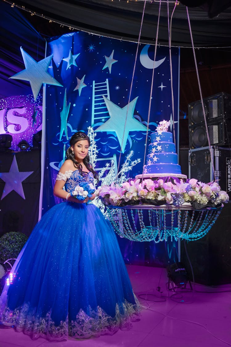 Elegant Young Woman In Blue Ball Gown 