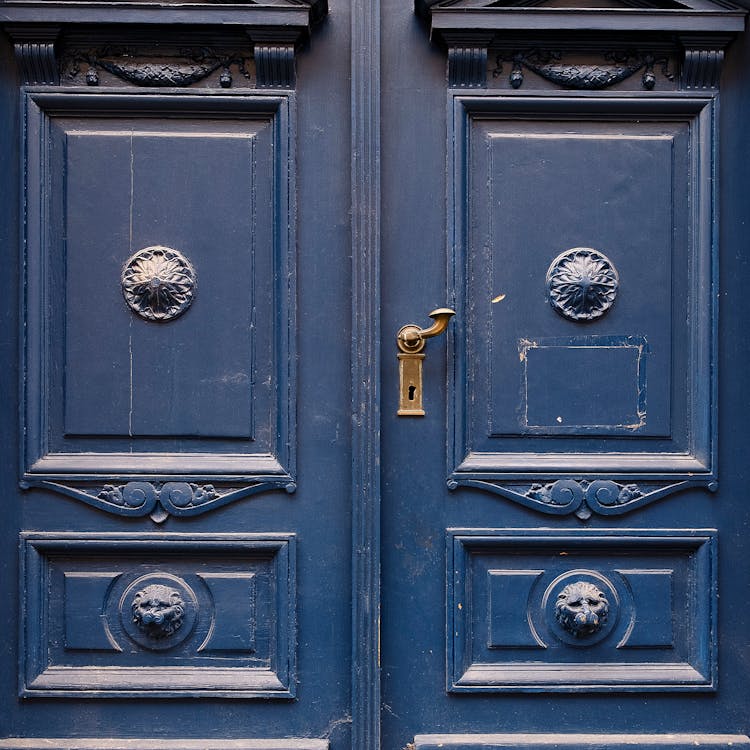 Blue Wooden Door With Gold Door Knob