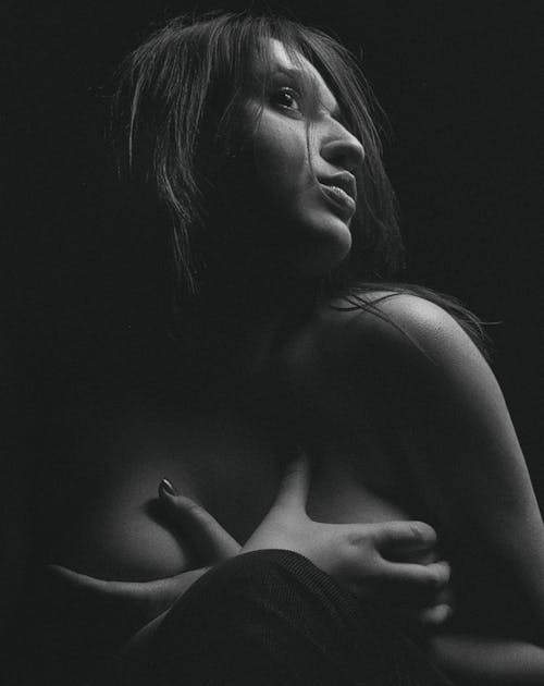 Free Grayscale Photo of Woman Covering her Chest Stock Photo