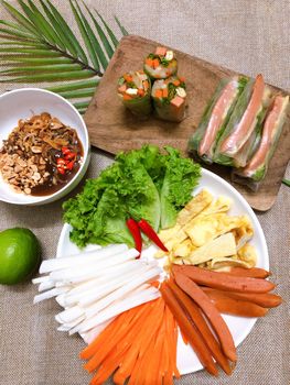 Colorful Vietnamese spring rolls with fresh ingredients and delicious dipping sauce.