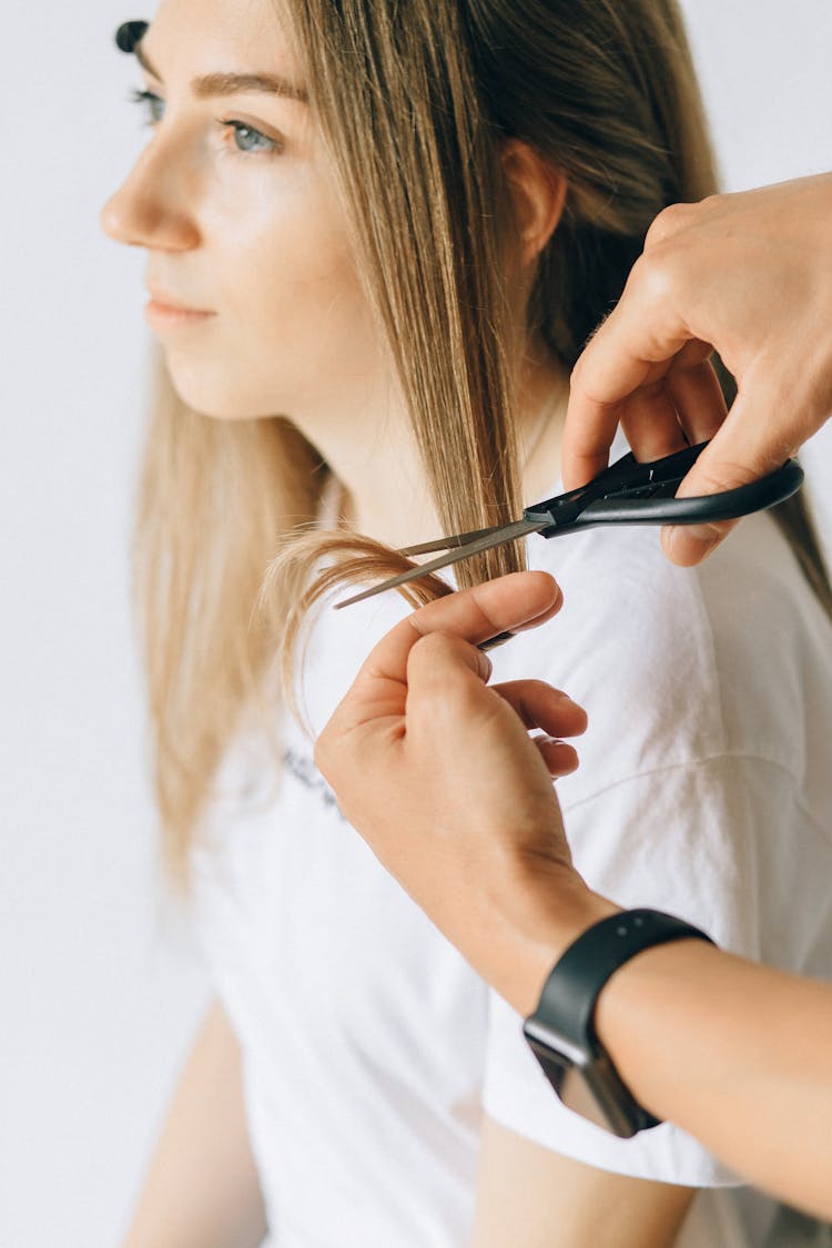 A Woman Having Her Haircut