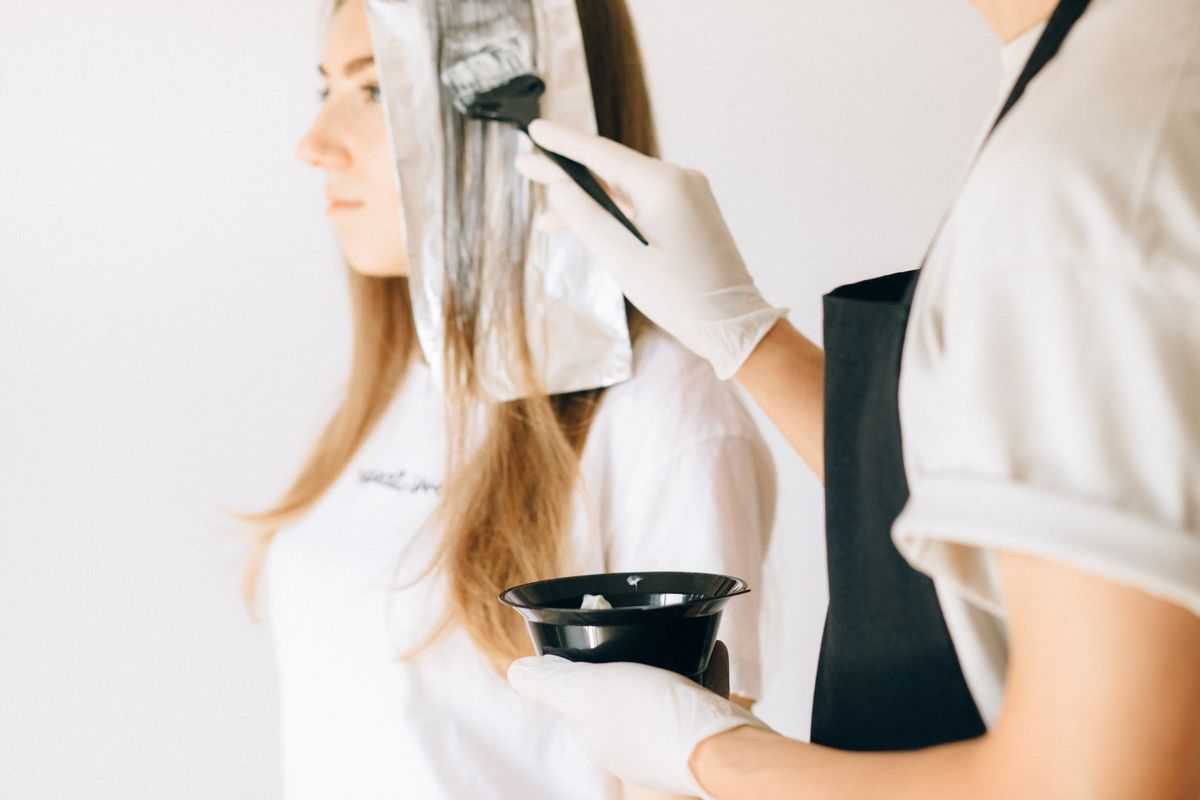 A client's hair being coloured at the salon