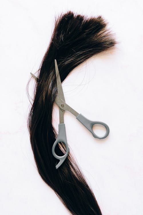 Gray and Silver Scissors on White Surface
