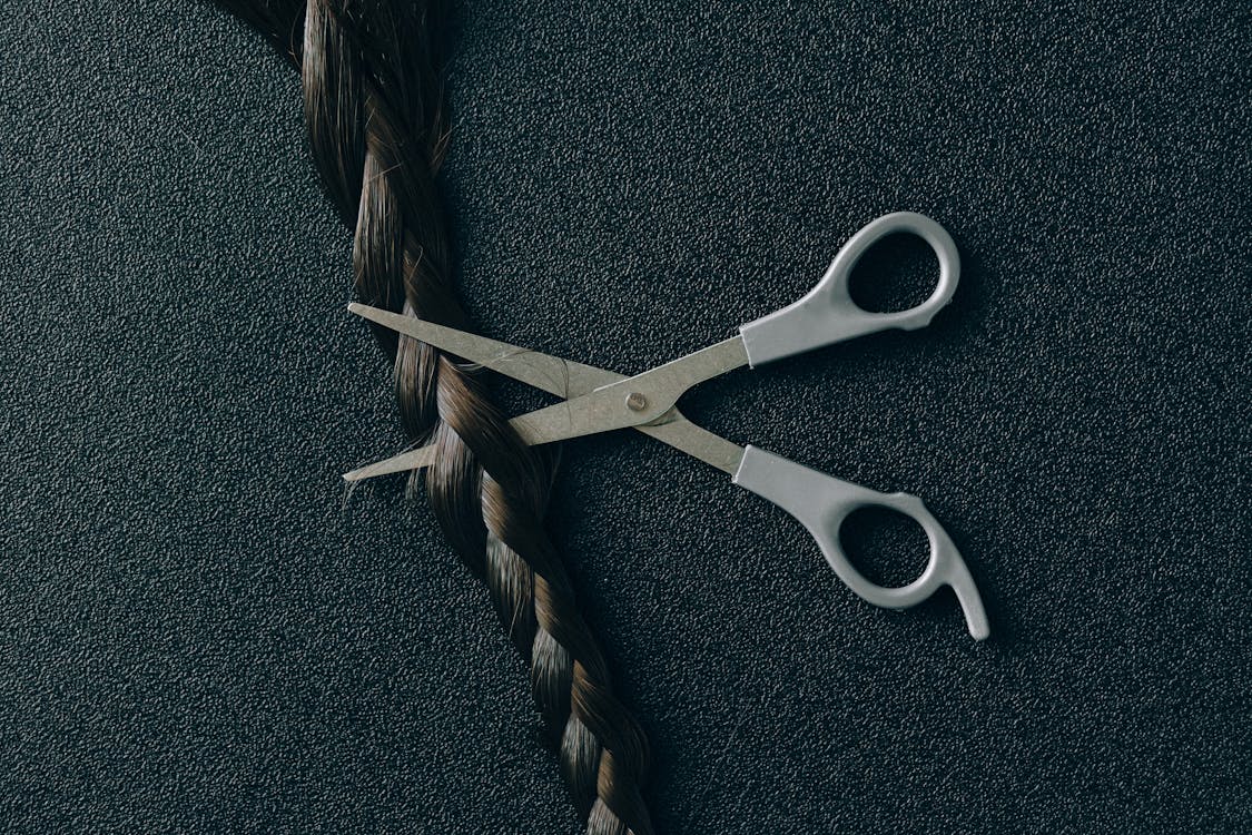 Free Photo of Scissors and Braided Hair Stock Photo