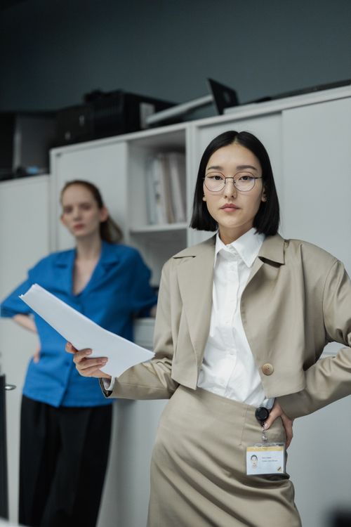 Free Two professional women in a modern office, showcasing leadership and confidence. Stock Photo