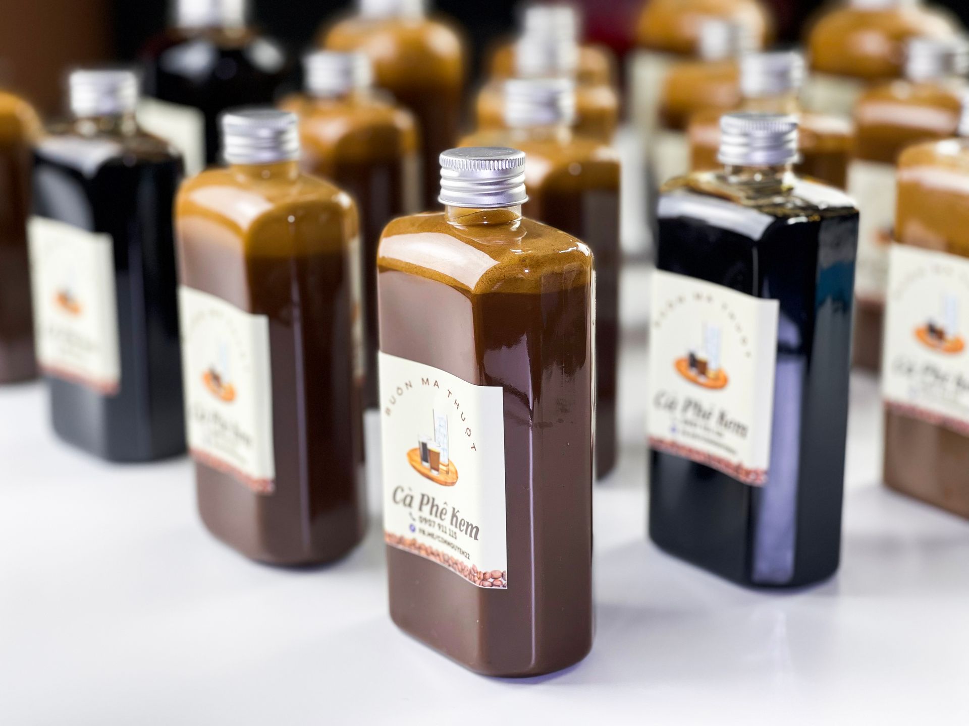 Bottles with various sweet syrups