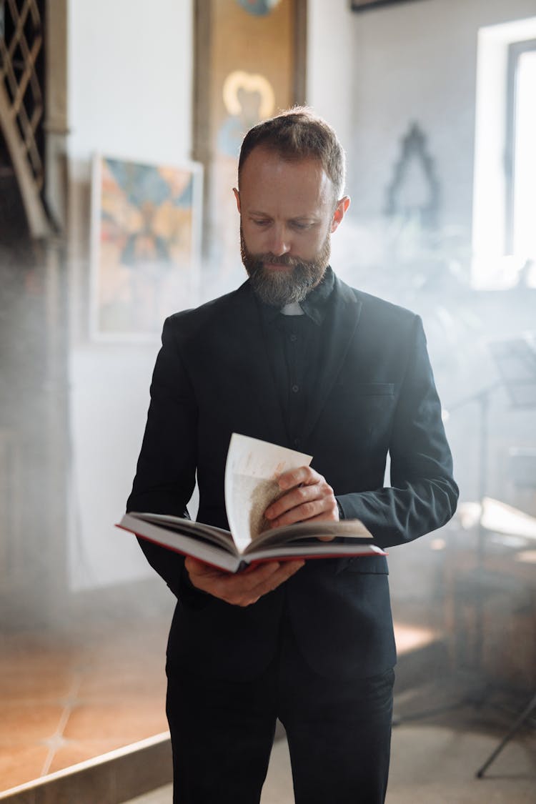 Priest Reading A Book 