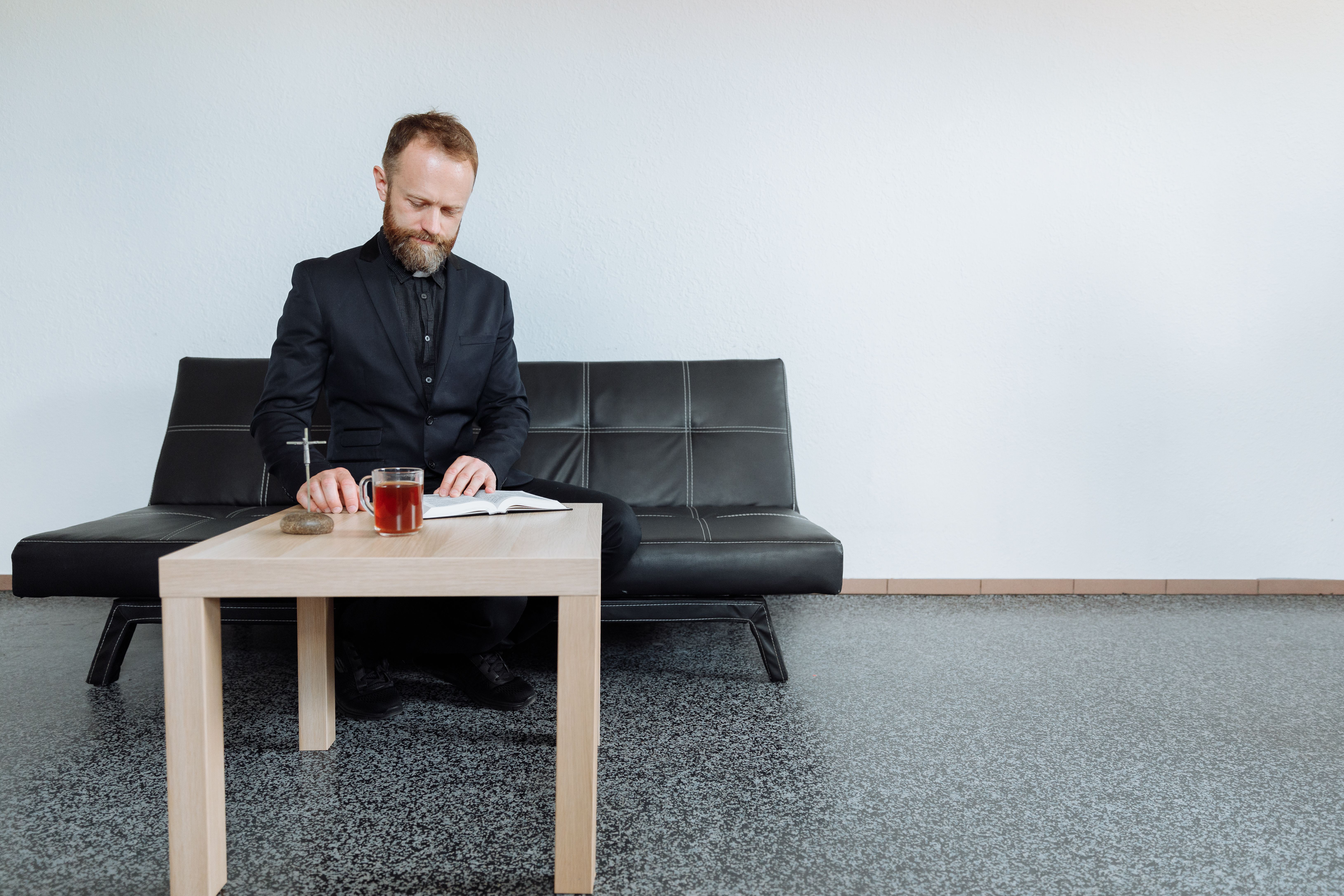 man contemplating cross, spiritual decision