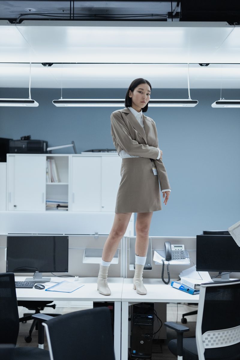 woman in a blazer and skirt outfit