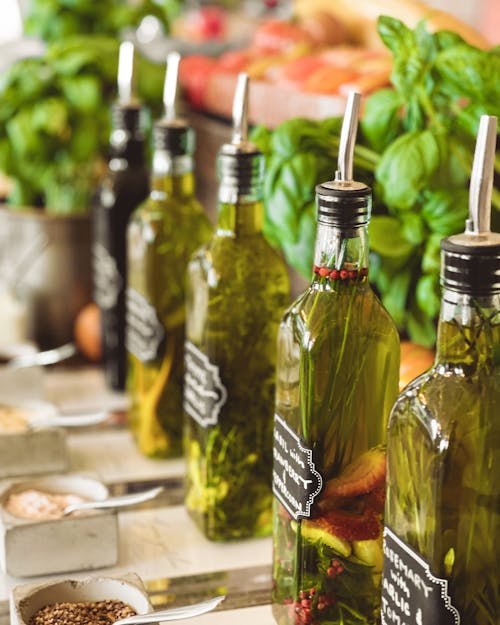 Close-up of Flavoured Olive Oil Bottles 
