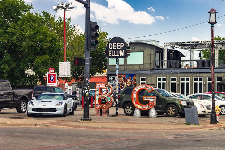 Cars In A Parking Lot At Deep Ellum In Dallas, Texas.