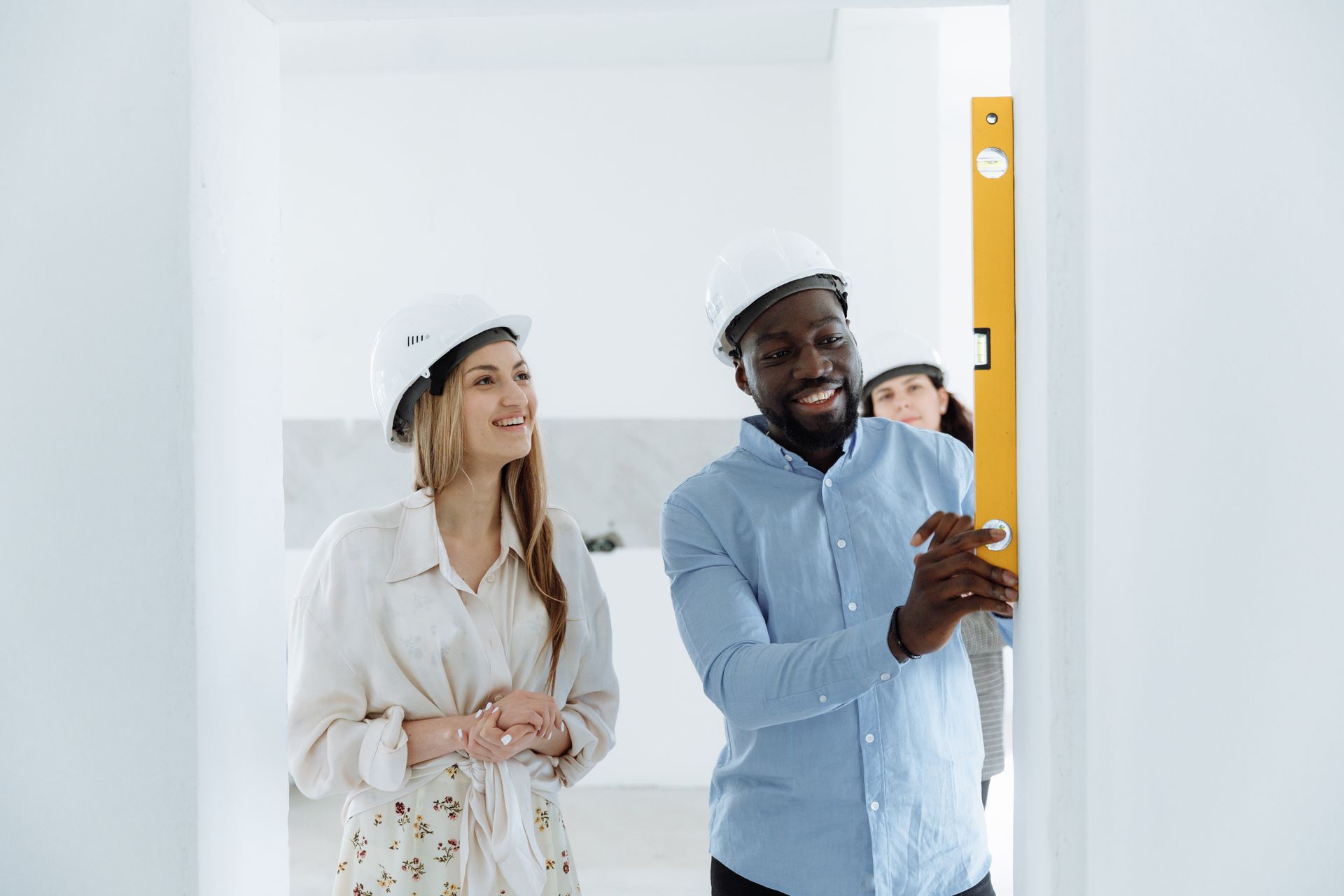 New House Owners Checking the Wall Levels