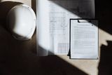Hard hat and construction documents