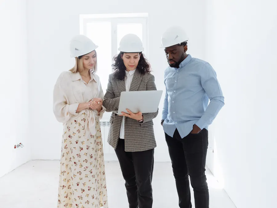 Engineers coordinating a multi-site rollout