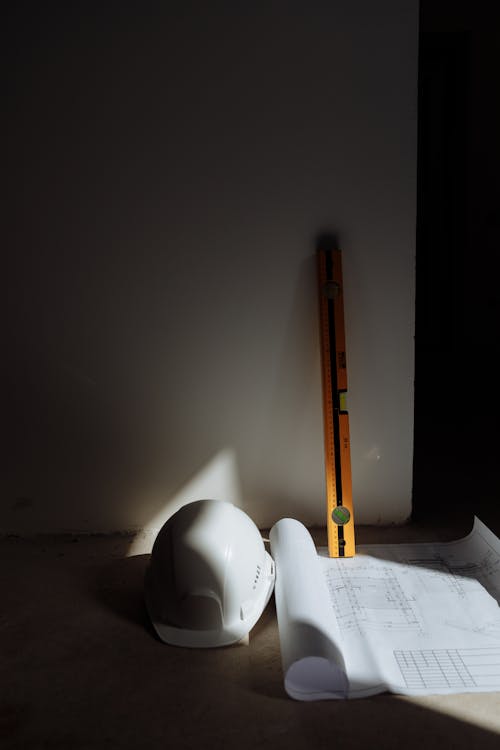 White Printer Paper Beside White Ceramic Mug