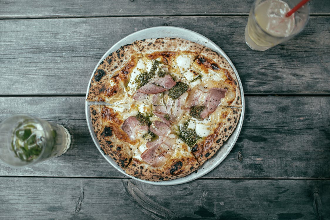 Free Round Pizza on the Plate Stock Photo