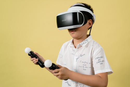 Free Boy Using Virtual Reality Headset Stock Photo