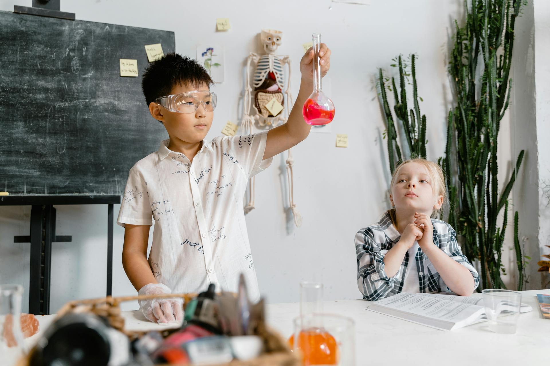 Students Doing a Science Experiment Inside the Laboratory