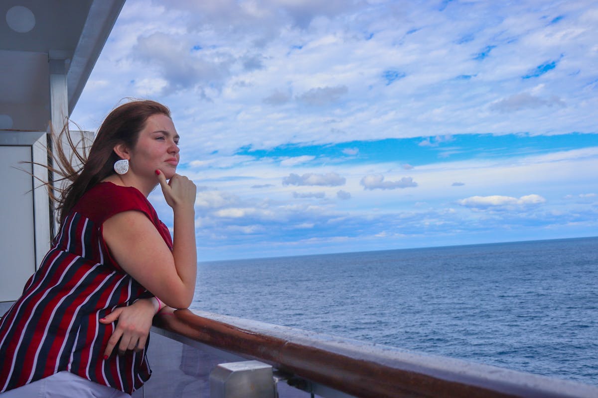 Woman swimming in a pool wearing protective goggles