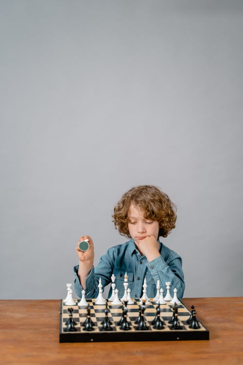 A Smart Boy Playing Chess