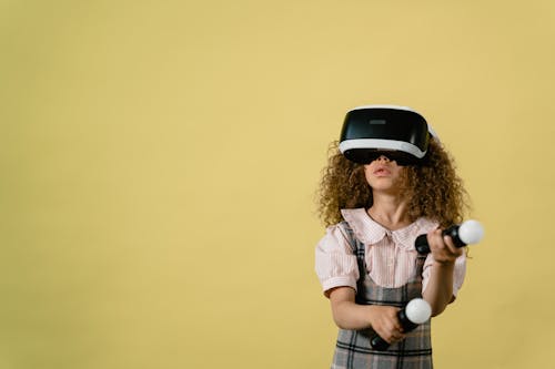 
A Girl Playing a Virtual Reality Game
