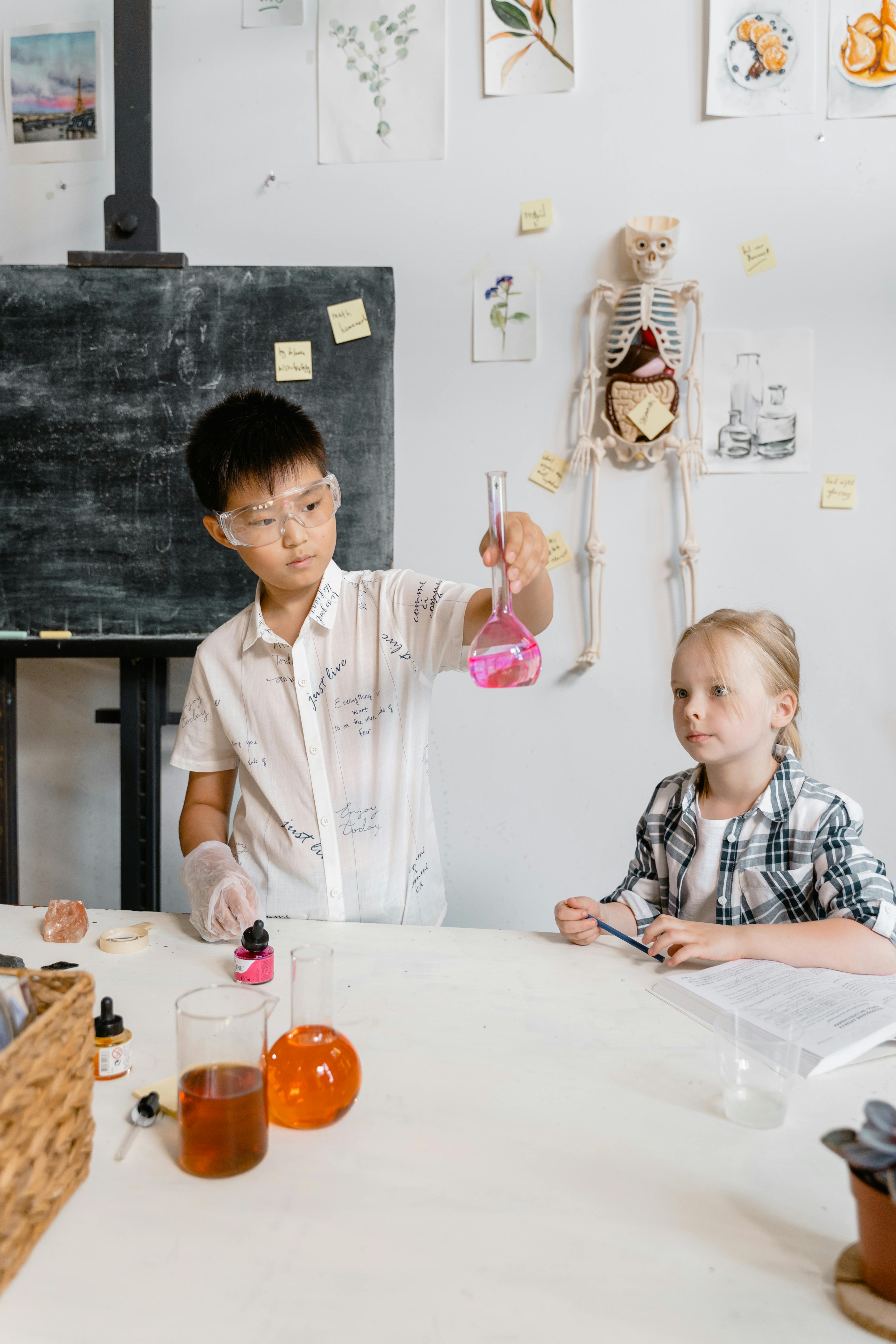 students experimenting using laboratory equipment inside the laboratory