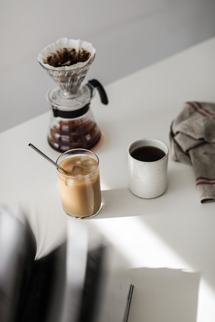 Iced Coffee And Hot Coffee On A Tabletop